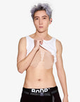 BnDR chest binding tape. model lifting a white tank to reveal beige tape on the chest.